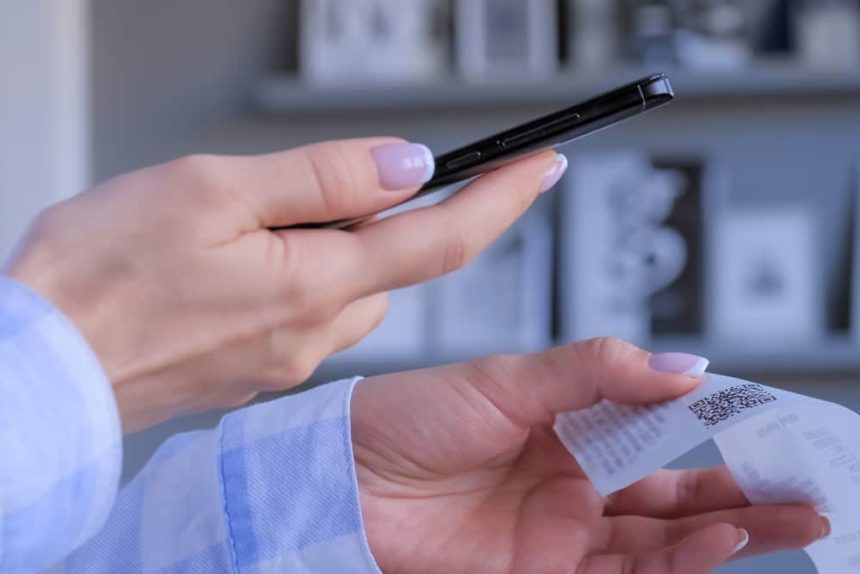 Scan Receipts For Money, woman scanning her receipt for cashback rewards